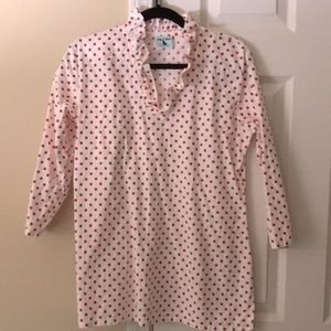 Small red, glitter dot tunic with ruffled neckline.